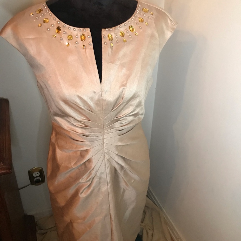 Jessica Howard,size 6, gold  stones around the neck.
